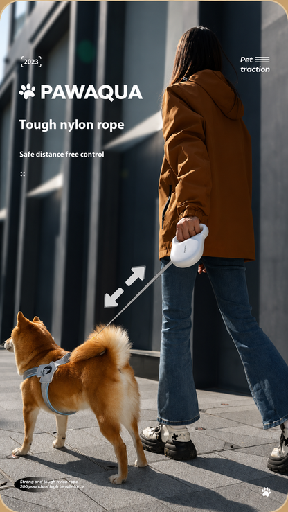 Woman walking a Shiba Inu with PawAqua retractable dog leash and tough nylon tape