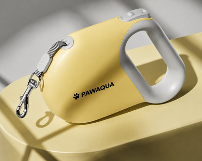 Yellow Pawaqua retractable dog leash with comfortable handle and metal clip
